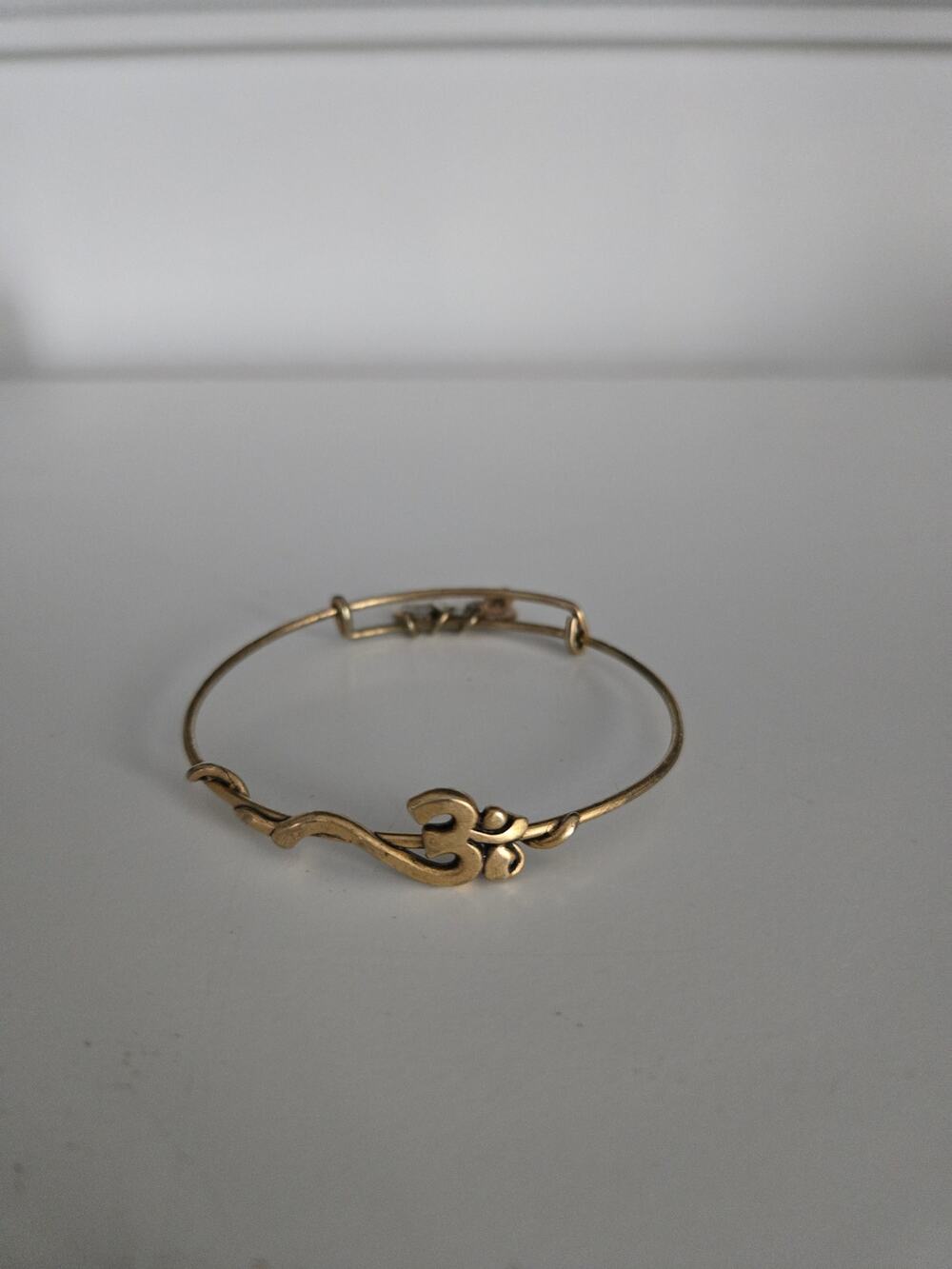 Alex and Ani Rafaelian Gold Horizontal Om Wrap Bangle Bracelet